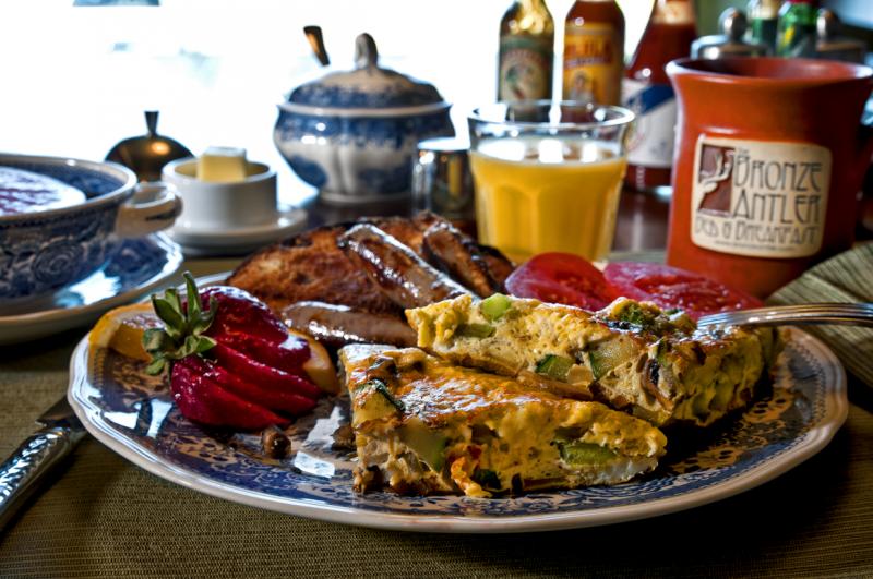 Signature Vegetable Frittata with all the sides at the Bronze Antler Bed & Breakfast. Photo by Unique Angles Photography.